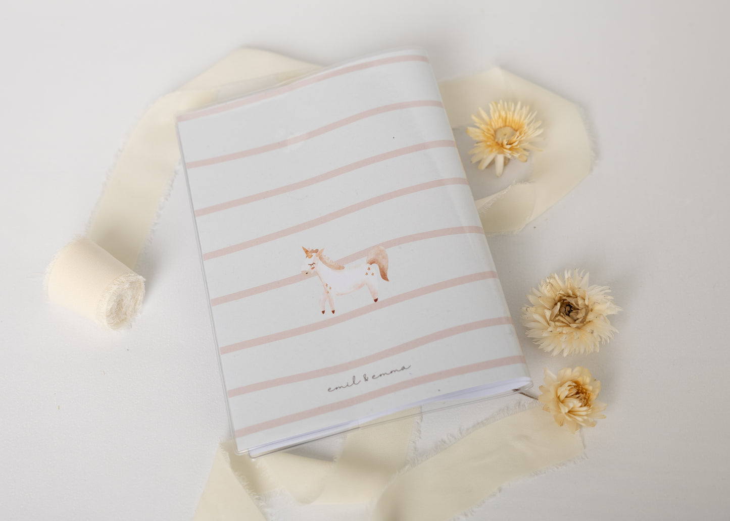 Hausaufgabenheft Hülle Einhorn gestreift personalisierbar